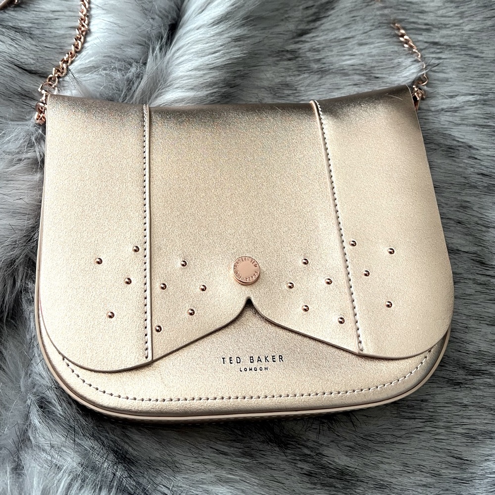 Ted Baker Crossbody bag in rose gold with tags.